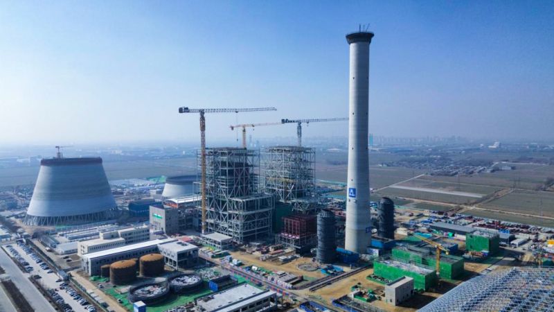 The outer chimney of the Shandong Energy Liaocheng Xiangguang 2×660 MW combined heat and power project has been successfully topped out.